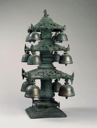 Miniature temple with bells