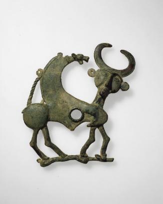 Cheekpiece of a horse bridle in the form of a mythical creature