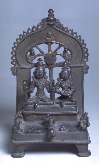 The Hindu deities Shiva and Parvati, their son Ganesha, the bull Nandi and a cobra