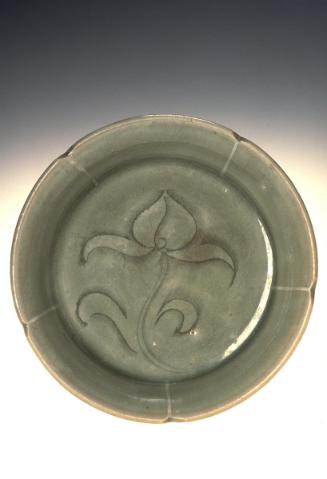 Flat-bottomed dish in the shape of a five-lobed flower