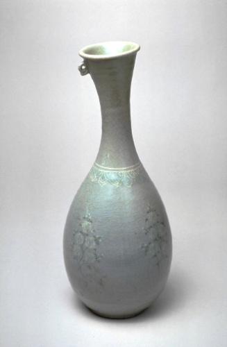 Bottle with chrysanthemum design