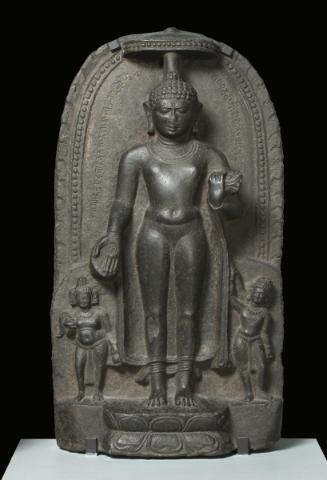 The Buddha descending from Indra's heaven flanked by the deities Brahma and Indra