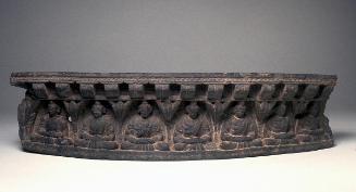 Fragment of a stupa with row of seated Buddhas