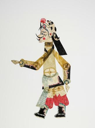 Black-whiskered male figure wearing headdress with red ball