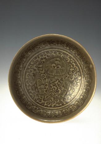 Bowl with a carved floral design