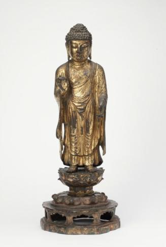 Buddha on lotus-shaped pedestal