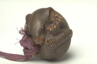 Netsuke of rat curled up into a ball