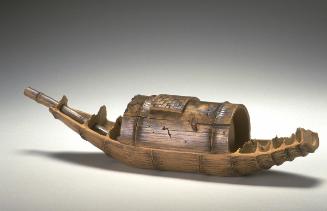 Teapot in the shape of a bamboo boat