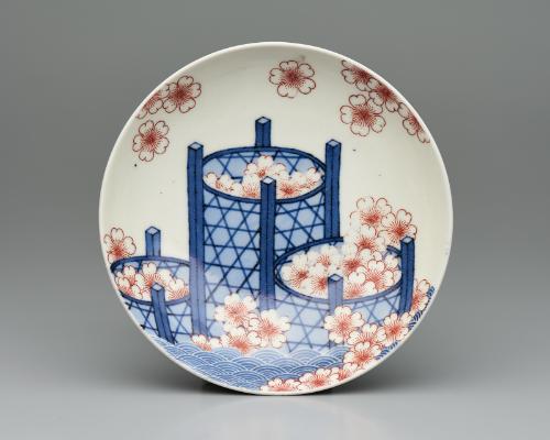 Dish with design of cherry blossoms, baskets, and stream