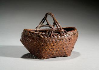 Boat-shaped charcoal basket
