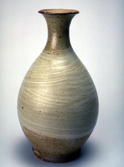 Elongated bottle with hakeme glaze