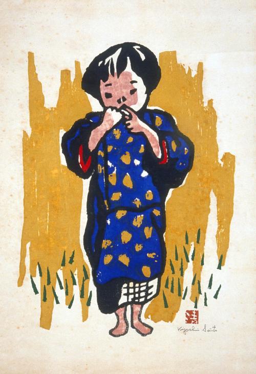 A boy in blue kimono