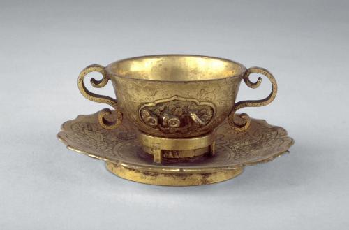 Cup and saucer, one of a pair