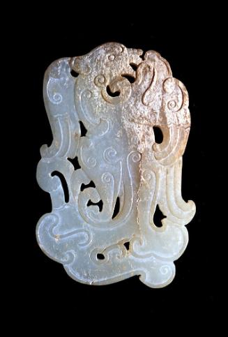 Pendant in a design of interlacing dragon and phoenix