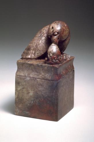 Seal-falcon finial