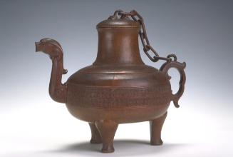 Ewer in the form of archaic vessel (he) with bird-headed spout