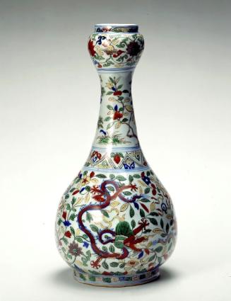 Vase with mouth in the shape of a garlic bulb