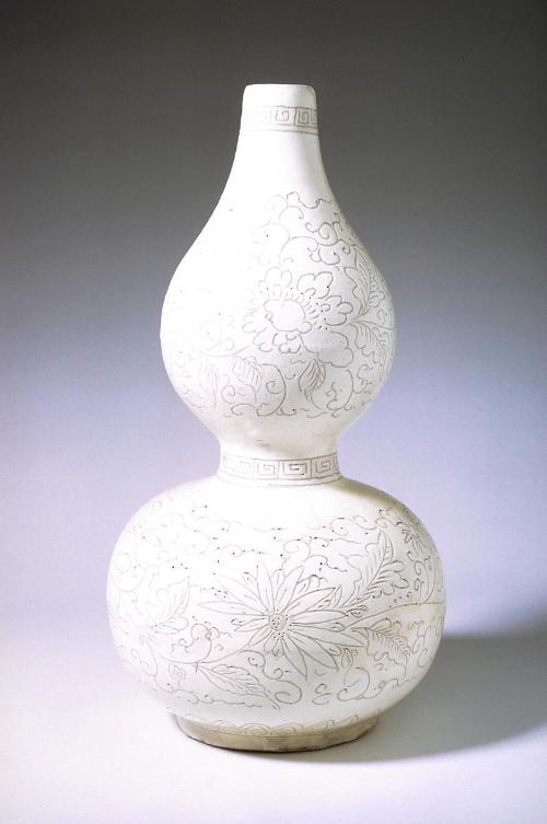 Gourd shaped vase with lotus, one of a pair