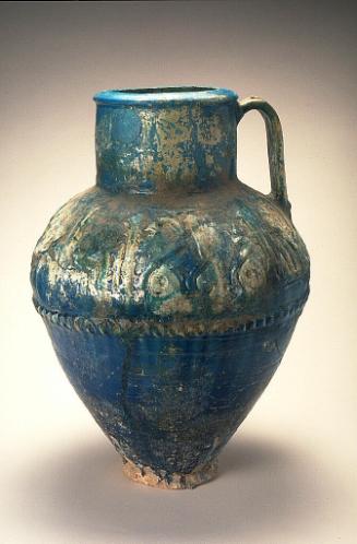 Storage jar with molded decorations and inscriptions