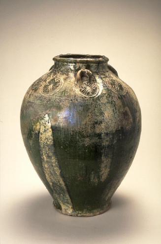 Storage jar with molded decoration