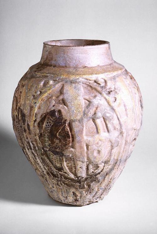 Jar with molded decoration