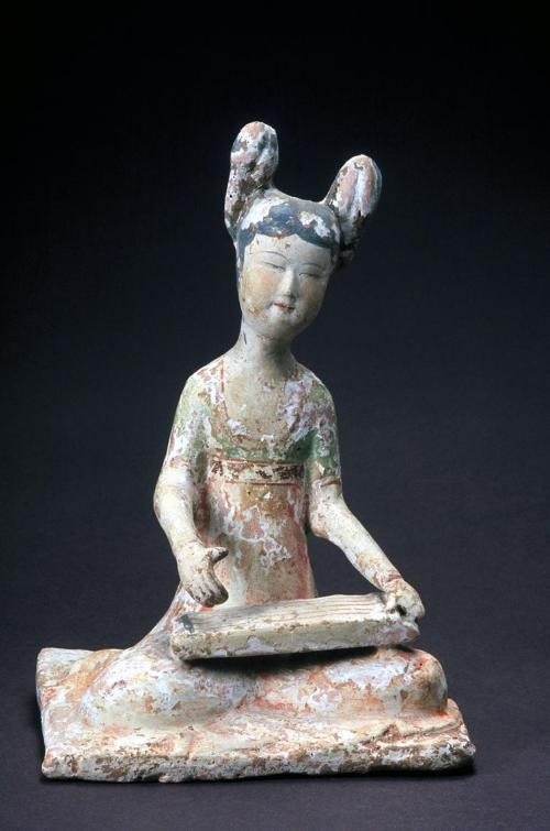 Seated musician, one of a set of four