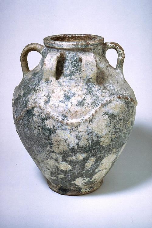 Storage jar with molded decoration