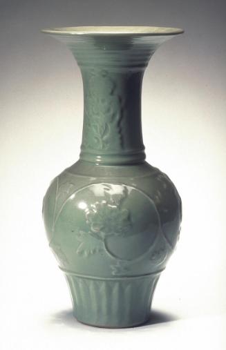 Vase with lotus motif in low-relief