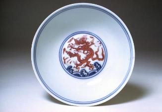 Bowl with a depiction of nine dragons, one of a pair