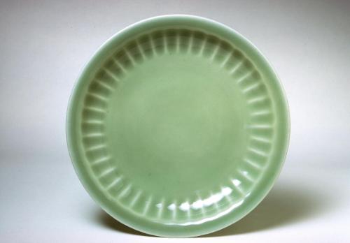 Lobed bodied saucer, one of a pair