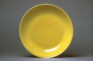 Plate with yellow glaze