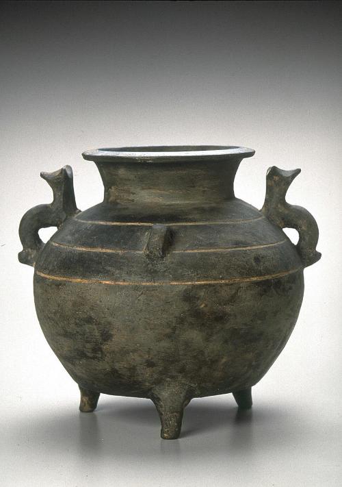 Tripod jar with three animal-shaped handles and legs