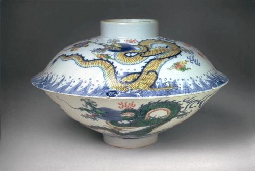 Bowl with dragons over ocean