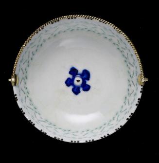 Shallow footed dish with English mount