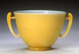 Cup with two handles, one of a pair