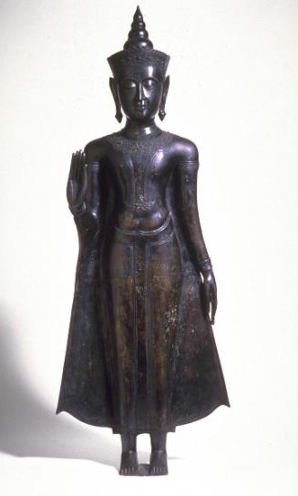 Standing Buddha with modern head