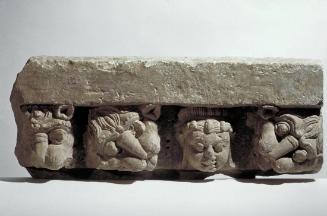 Architectural element with human and lion heads