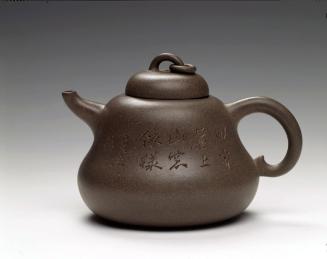 Teapot with ring on lid