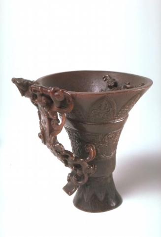 Footed cup with dragon handles