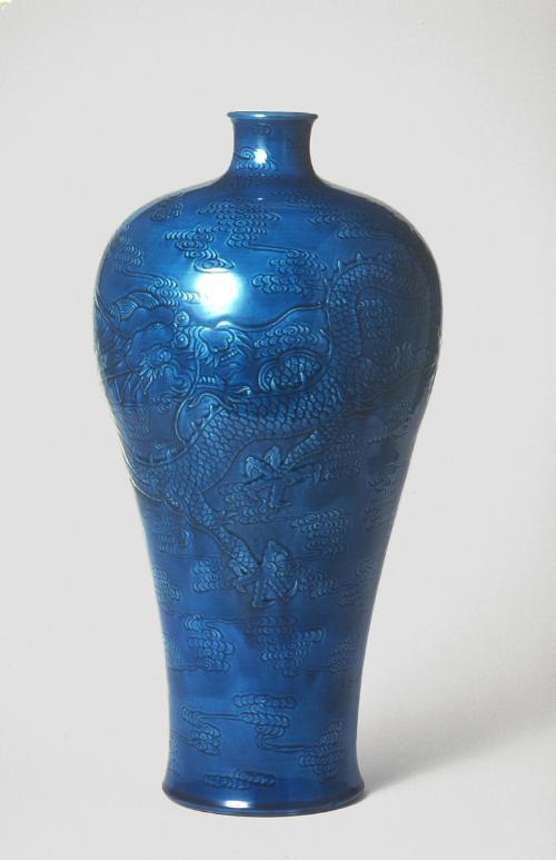 Vase with design of dragon amid clouds