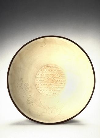 Dish with incised moon and prunus motif