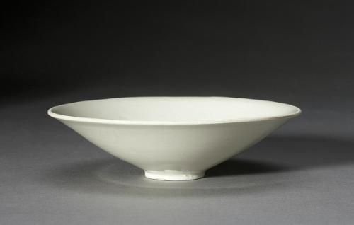 Deep saucer with flaring sides, one of a pair