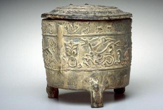 Covered tripod jar with two low-relief handles