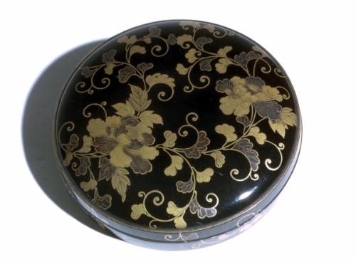 Round container with peony scrolls