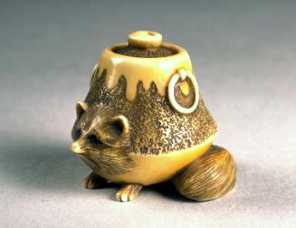 The tanuki (raccoon dog) that turned into a tea kettle (from the folktale Bunbuku Chagama)