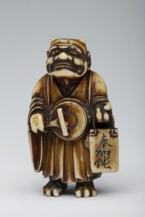 Oni (demon) in Buddhist priest's robes chanting Nenbutsu prayer