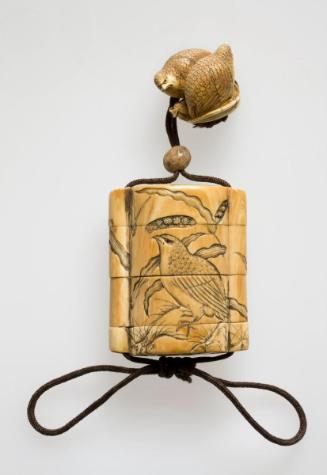 Netsuke of quail and millet