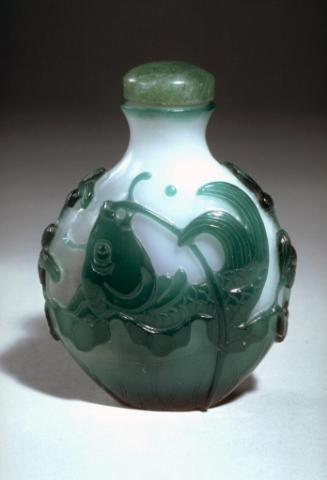 Snuff bottle with a fish wrapped in a lotus leaf