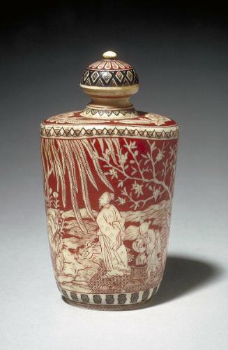 Snuff bottle with figures in a landscape