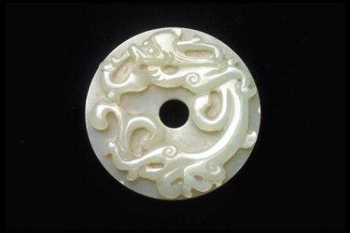 Disk with a dragon in an ancient style